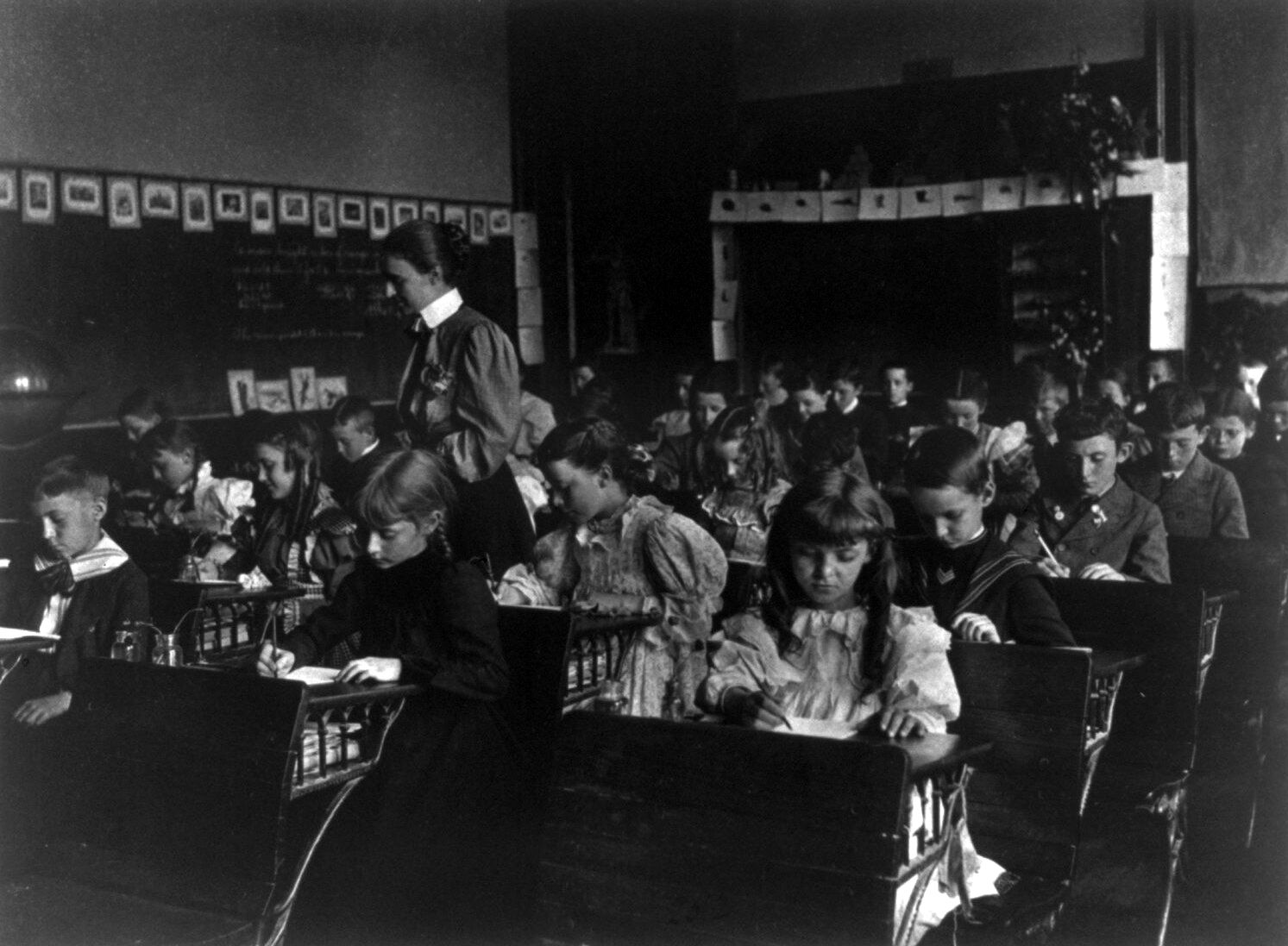 Pupils at work, Washington, D.C., 1899. Other countries chose other ways to pay for this room.
